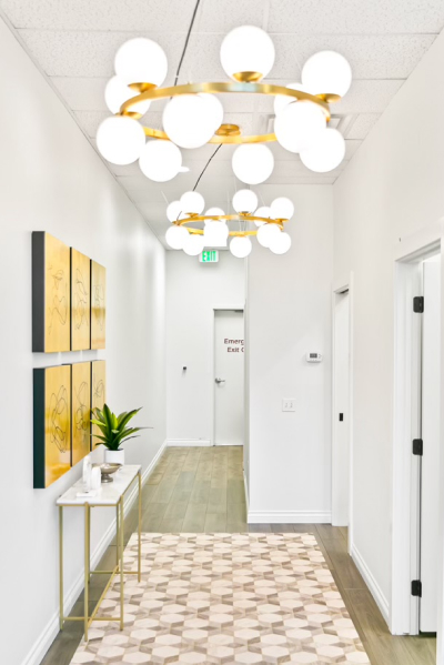 Aesthetic beauty office inside view with framed arts on wall